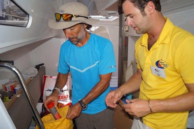 Jake Albano carrying out a Safety check on board Here and Now © WCC / Isabelly Tremblay